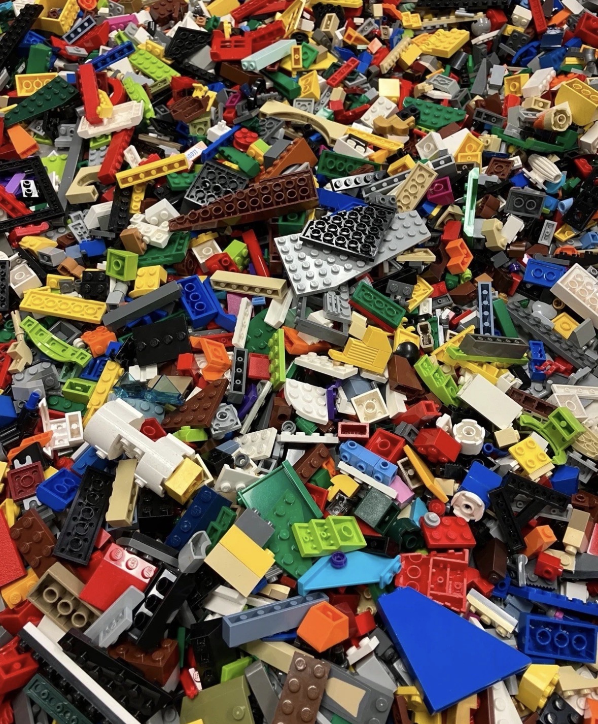 A close look at the mixed LEGO pieces handled by SML Bricks